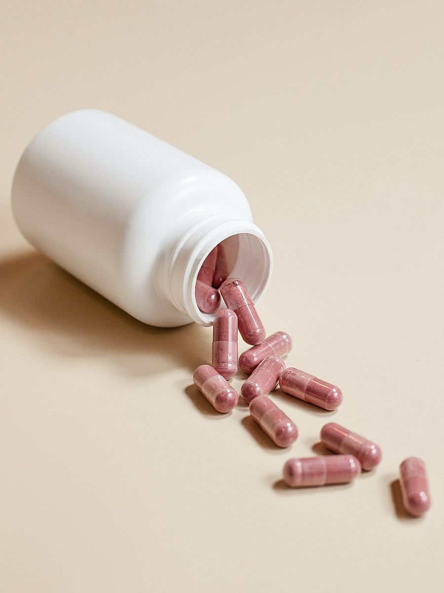 Supplement bottle with capsules